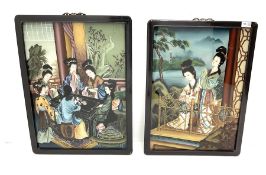 A pair of Chinese back-painted glass pictures depicting geisha