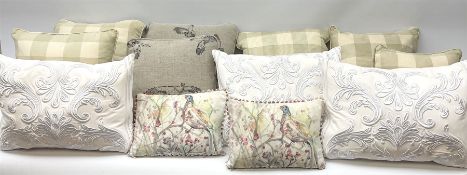 A group of twelve assorted cushions
