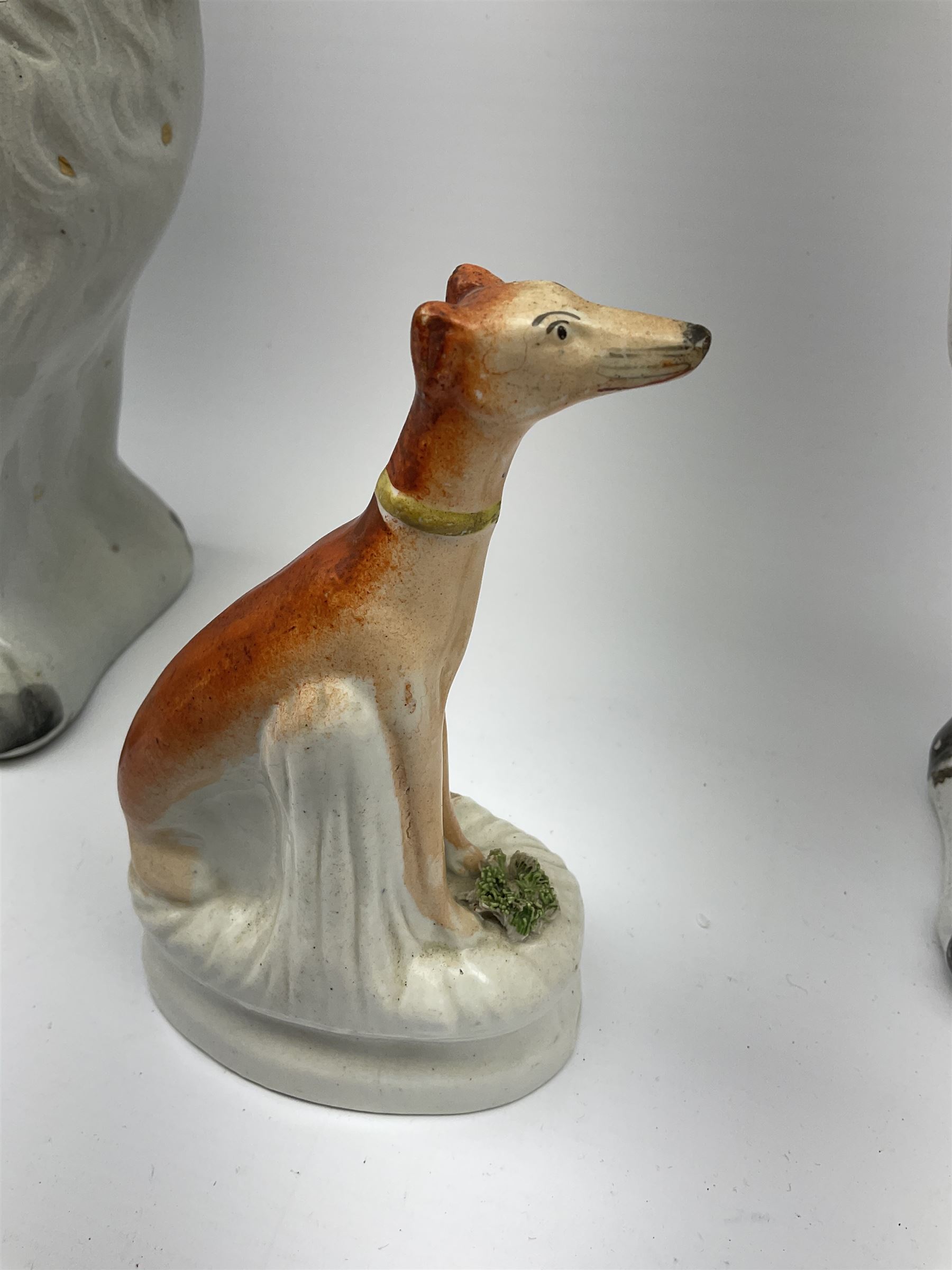 A pair of Victorian Staffordshire white glazed spaniels - Image 5 of 9