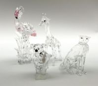 A group of four Swarovski Crystal figures