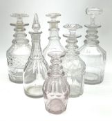 A group of six ring neck decanters