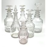 A group of six ring neck decanters