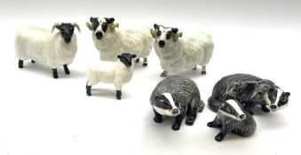 A Beswick Badger family comprising male