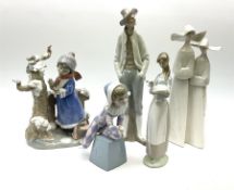 A group of five Lladro figures