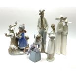 A group of five Lladro figures