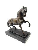 Bronze figure modelled as a prancing horse