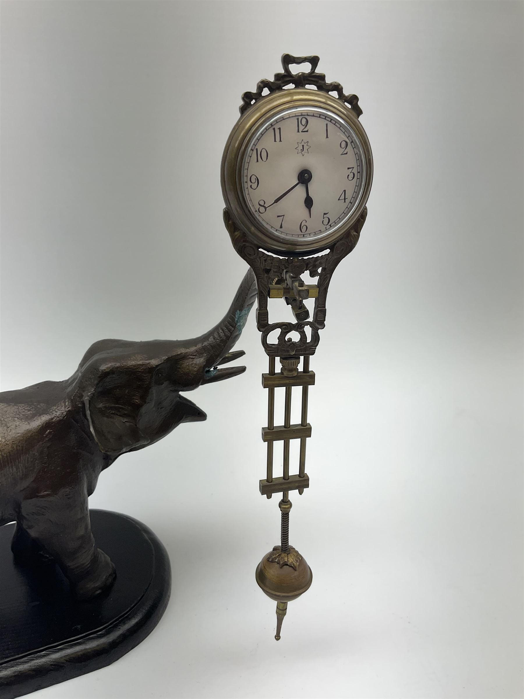 A spelter mystery clock modelled as an elephant supporting the clock upon its trunk - Image 2 of 9