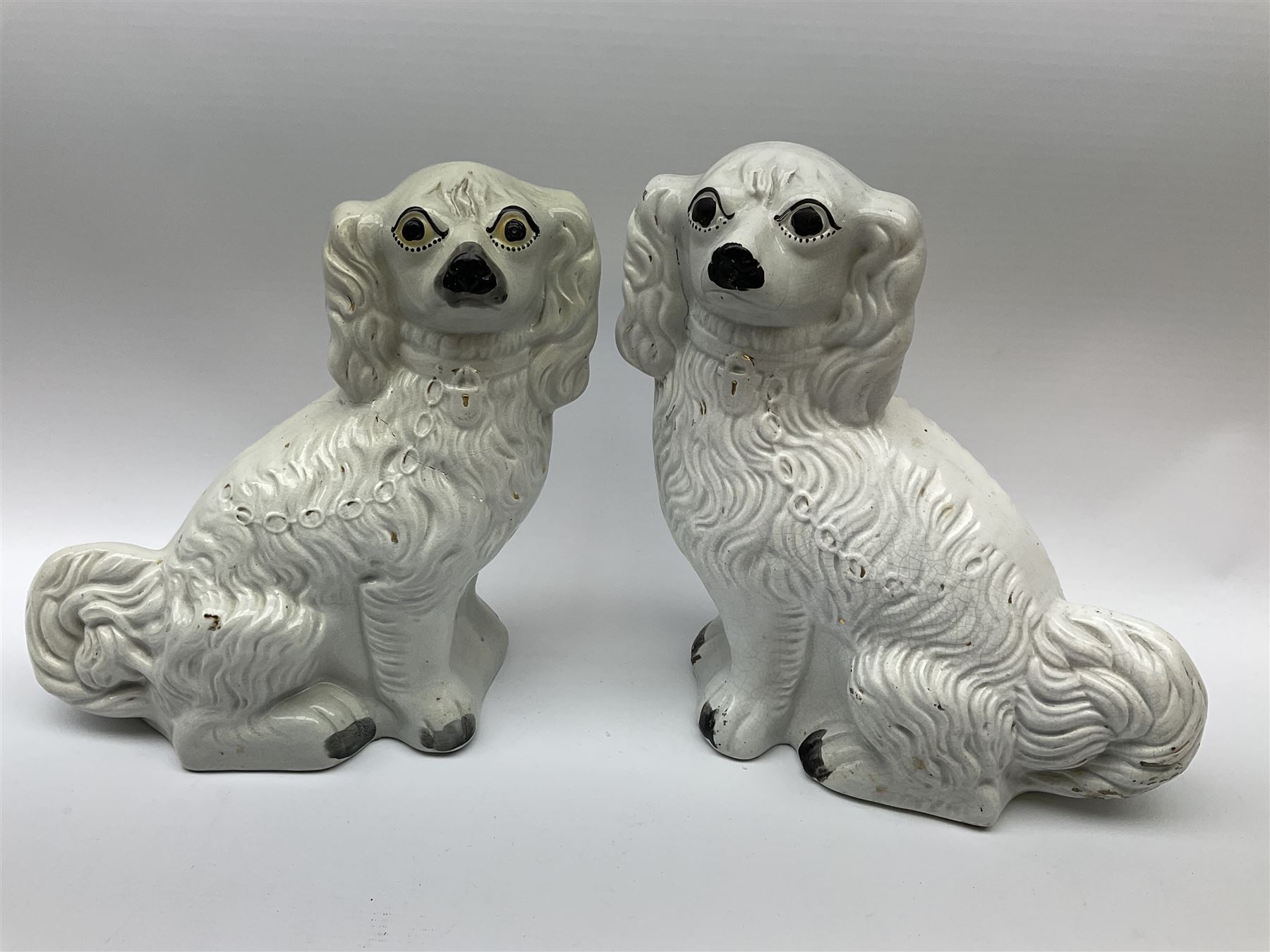 A pair of Victorian Staffordshire white glazed spaniels - Image 7 of 9