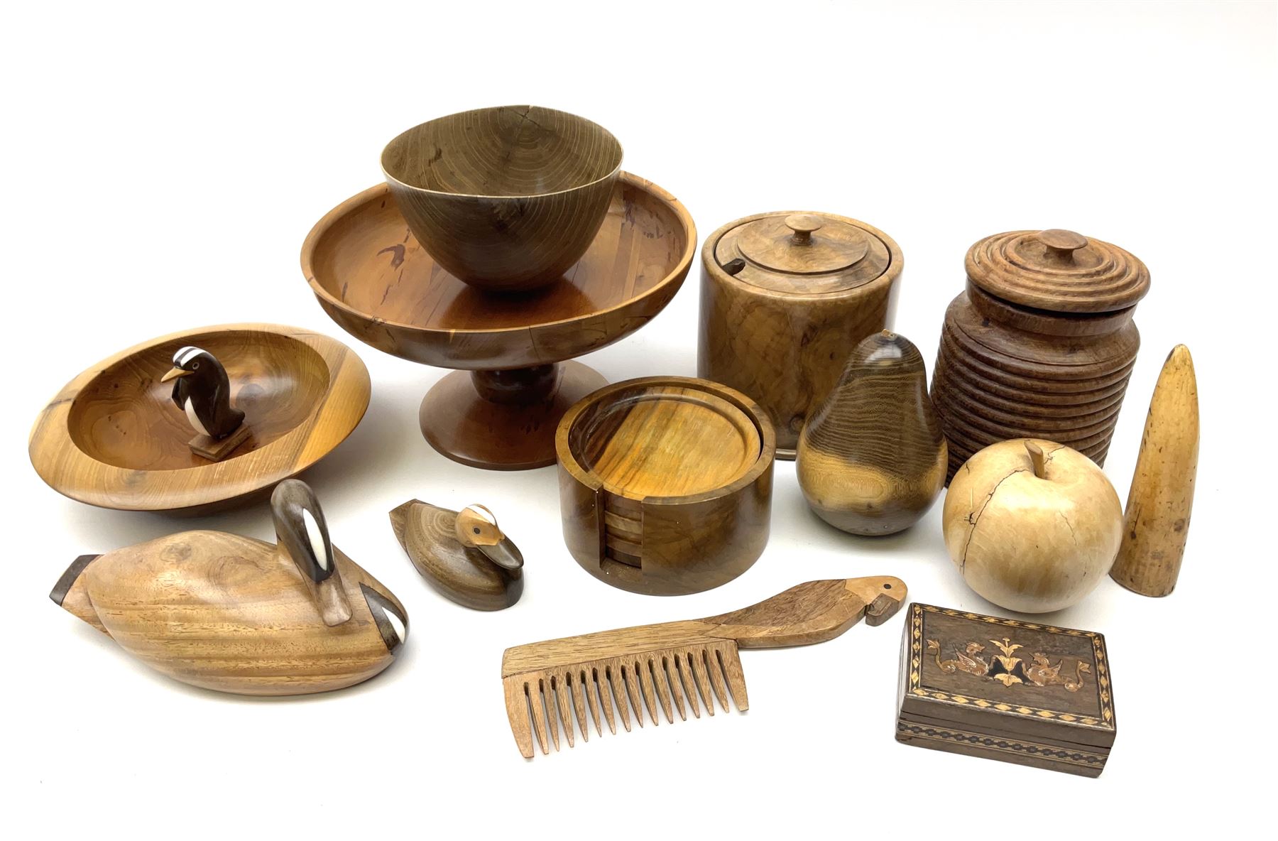 Collection of treen items including walnut jar
