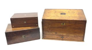 A Victorian oak slope top correspondence box with draw base