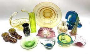 A group of coloured glassware