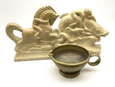 A Chinese bronze vessel with loop handle and footed base