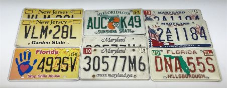 Nine American licence plates including three Florida