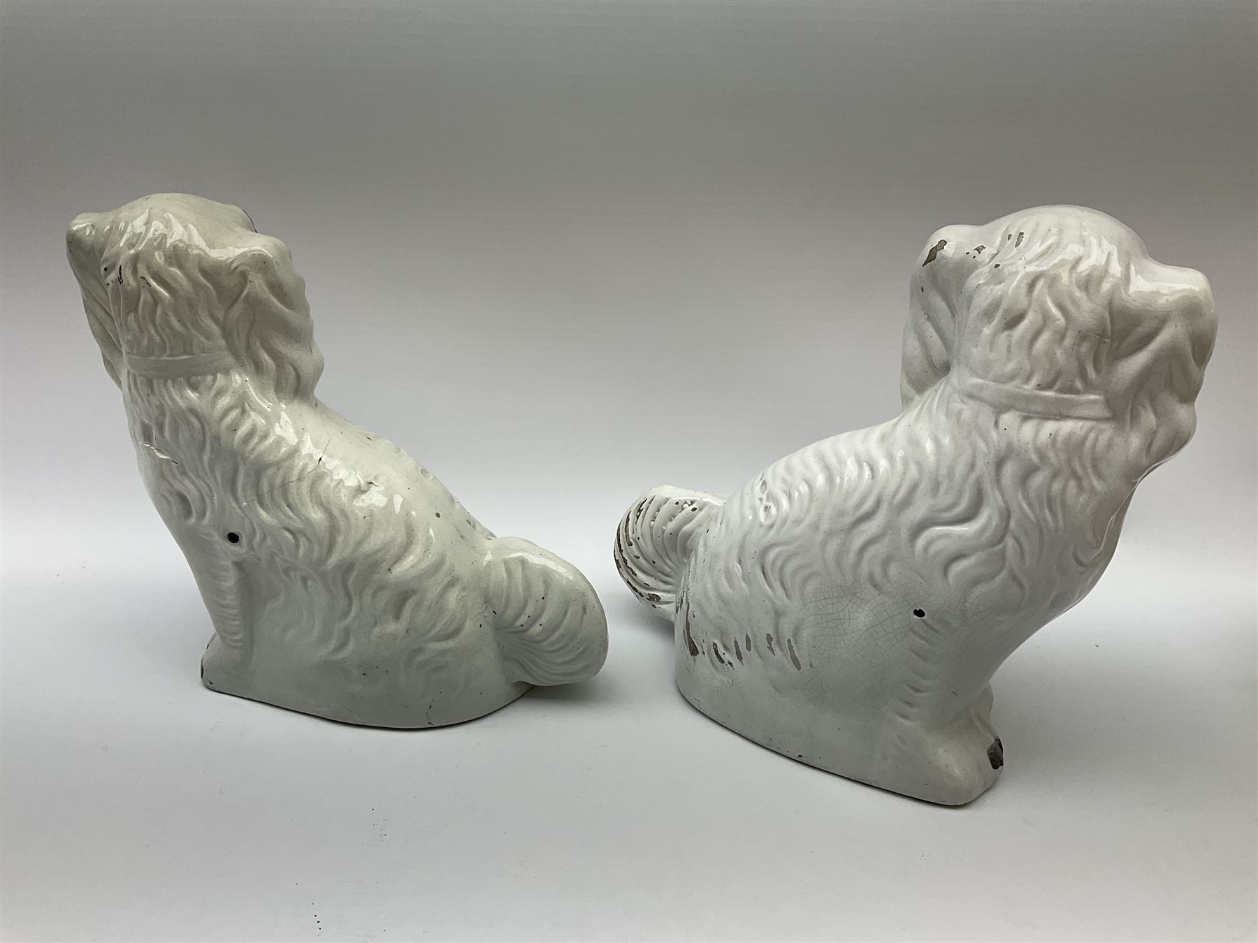 A pair of Victorian Staffordshire white glazed spaniels - Image 9 of 9