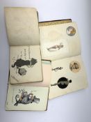 Three autograph albums and sketchbooks containing paintings