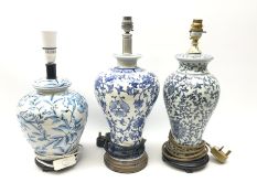 Three blue and white table lamps