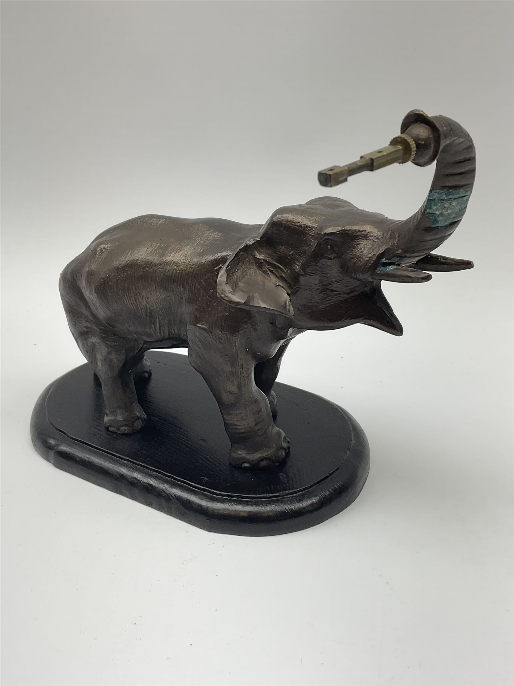 A spelter mystery clock modelled as an elephant supporting the clock upon its trunk - Image 8 of 9