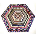 An early/mid 20th century hexagonal patchwork cover of hexagonal form