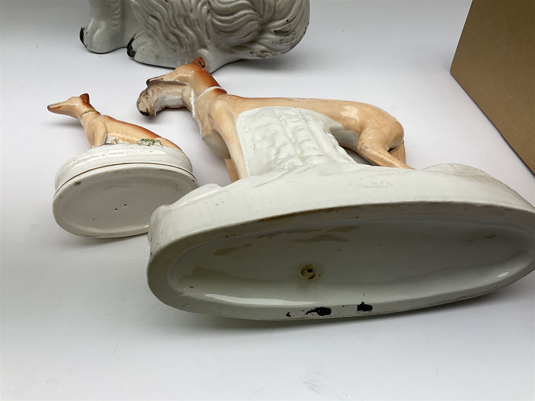 A pair of Victorian Staffordshire white glazed spaniels - Image 6 of 9