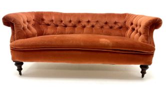 Victorian three seat settee upholstered in deep buttoned terracotta fabric