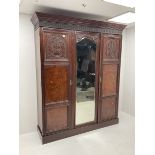 Late Victorian walnut triple wardrobe