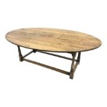 17th century style oval distressed light oak plank top dining table