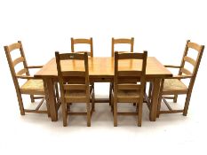 Light oak rectangular dining table with two leaves
