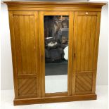 Early 20th century ash triple wardrobe projecting cornice