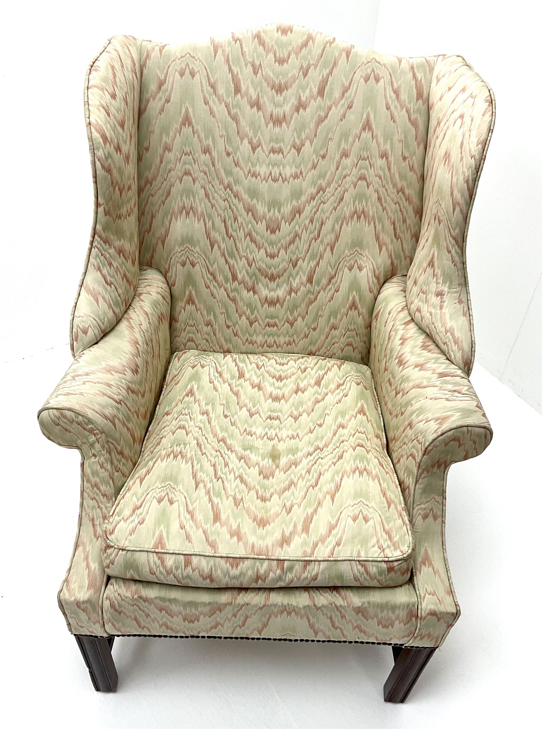 Georgian style mahogany framed wingback armchair upholstered in a beige ground fabric - Image 4 of 4