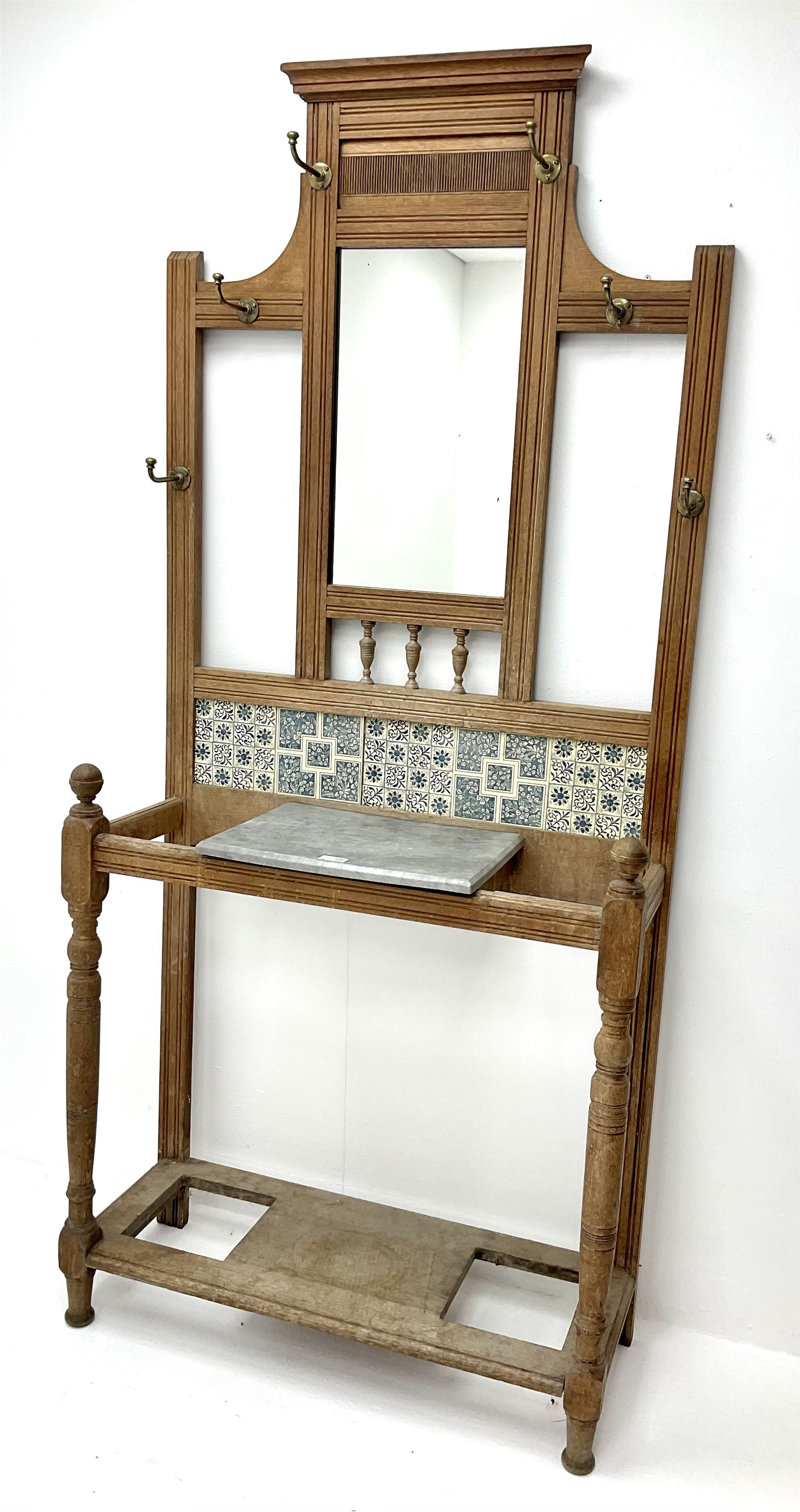 Edwardian walnut hallstand with centre mirror and tiled back