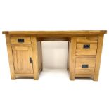 Light oak twin pedestal desk one shallow and two deep drawers
