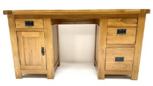 Light oak twin pedestal desk one shallow and two deep drawers