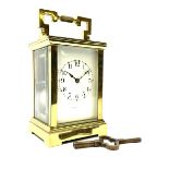 Early 20th century brass and bevelled glass carriage clock