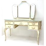 French style cream and gilt kidney shaped dressing table with Teri ole mirror