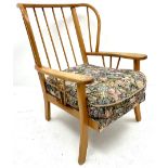 Mid century beech framed spindle back easy chair