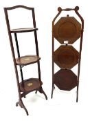 Two early 20th century mahogany three tier folding cake stands
