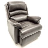 Armchair upholstered in dark leather