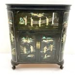 Hong Kong black lacquered cocktail cabinet with shibiyama style decoration of figures in a garden