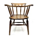 Early 20th century elm smokers bow armchair