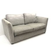 Two seat sofa upholstered in a grey fabric