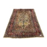 Persian ivory and red ground Tree of Life rug