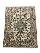 Fine Kashan ivory ground rug