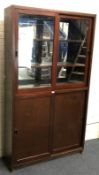 20th century pine mirror back display cabinet with sliding glass doors revealing two shelves