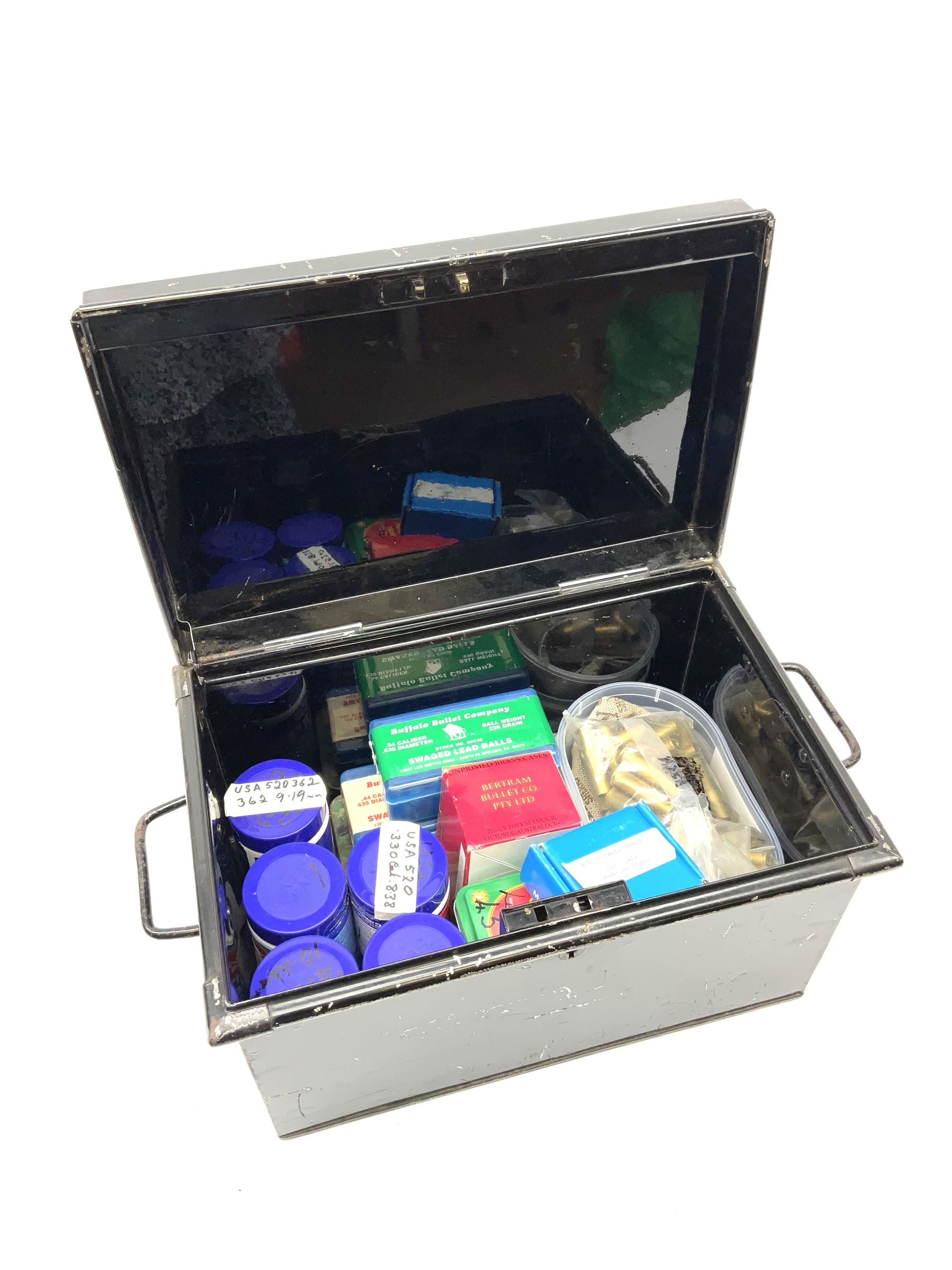 Tin deed box containing quantity of various gauge cartridge re-loading materials including brass