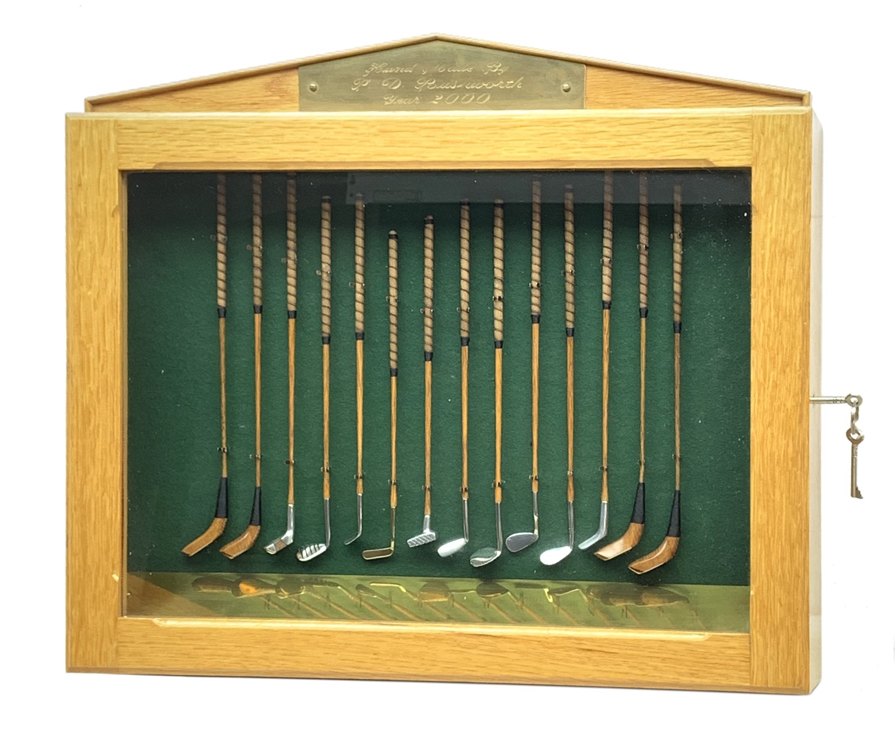 Modern handcrafted miniature set of fourteen 19th century style golf clubs by P.D. Rushworth dated