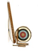 Slazenger juvenile long bow marked 10lbs./4'0"/26" L117cm; with quiver of eight arrows and 63cm diam