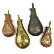 Four copper/brass graduated powder flasks