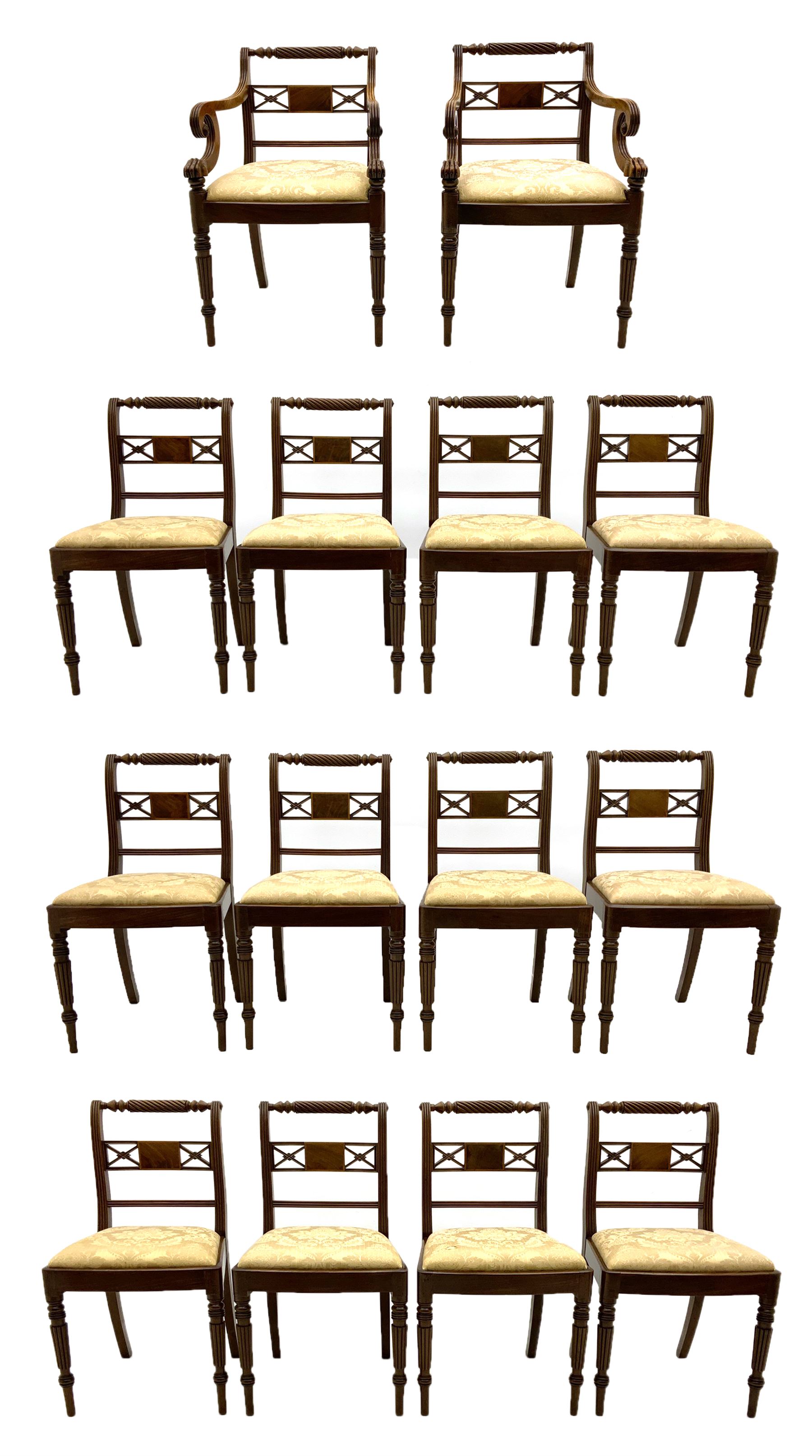 Set of fourteen Regency mahogany dining chairs