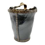 Victorian leather fire bucket with riveted detail and leather carry handle
