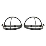 Pair of wrought iron wall mounted candle sconces
